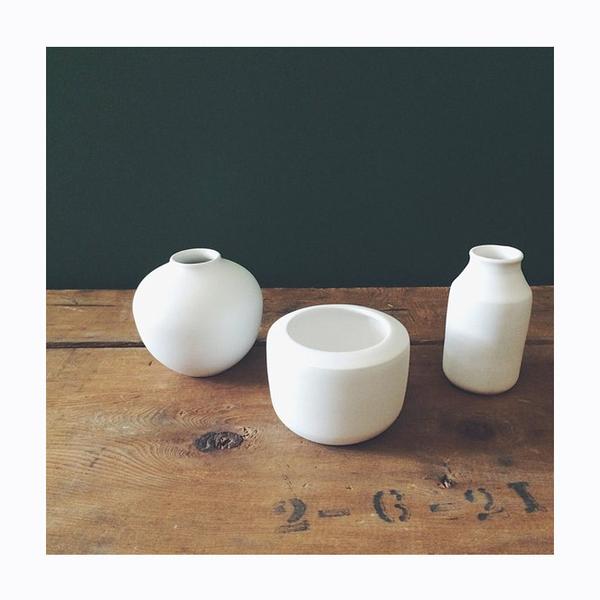 Beautiful trio of ceramics on a wood table. Photo print by Instagrammer and Cambie Design owner Camille Byrne.  This print and another 11 for sale on the Impressed Print Shop